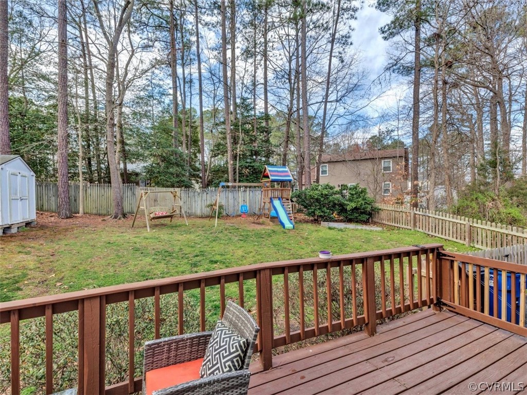 2606 Colgrave Road Midlothian, VA 23112 - Photo 18 of 22 a view of a wooden deck and a yard with wooden fence