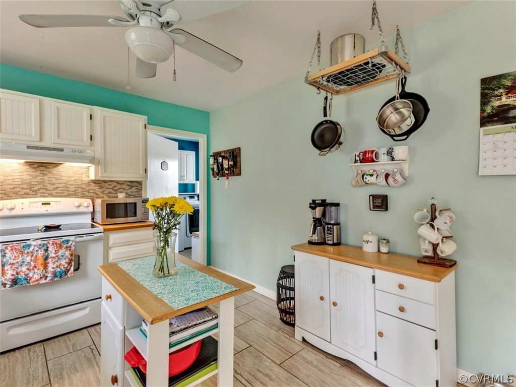 2606 Colgrave Road Midlothian, VA 23112 - Photo 6 of 22 a kitchen with a cabinets and chandelier