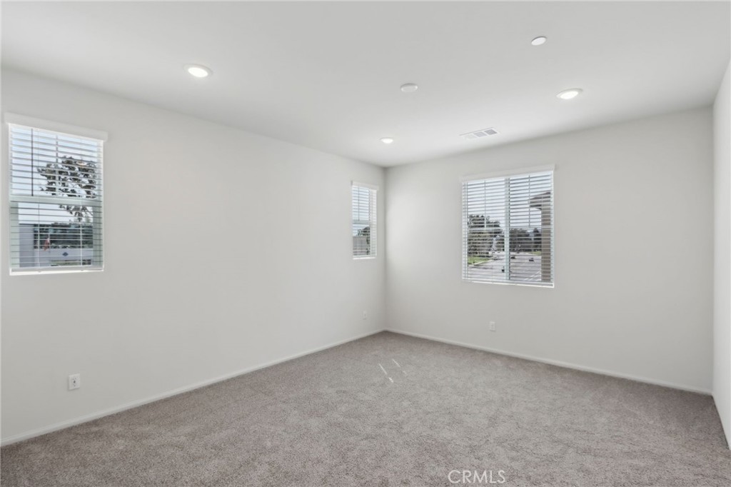 29527 Via Cosecha Temecula, CA 92591 - Photo 16 of 35 an empty room with windows