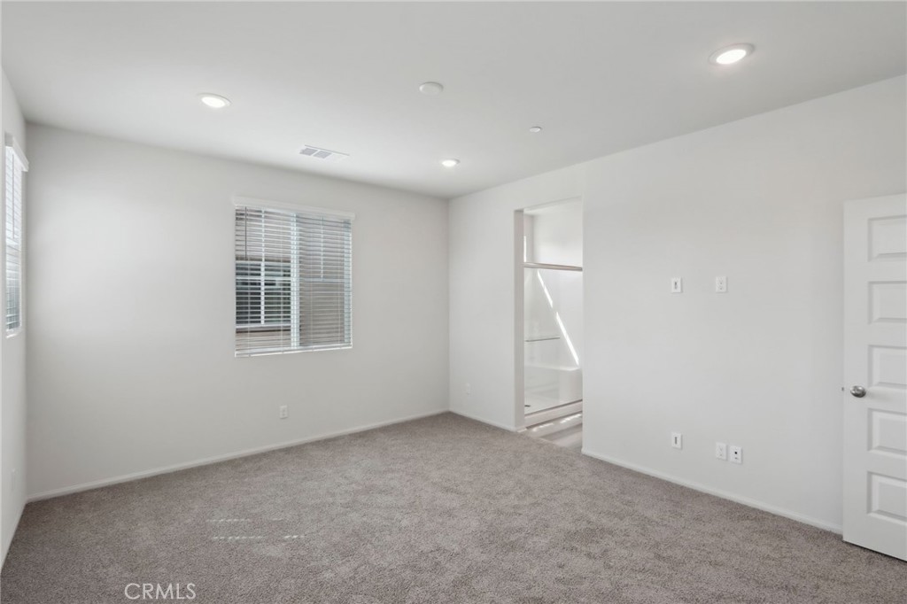 29527 Via Cosecha Temecula, CA 92591 - Photo 20 of 35 an empty room with windows