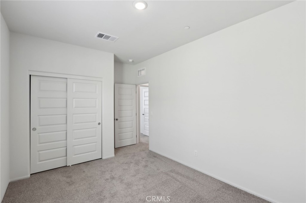 29527 Via Cosecha Temecula, CA 92591 - Photo 28 of 35 an empty room with closet area