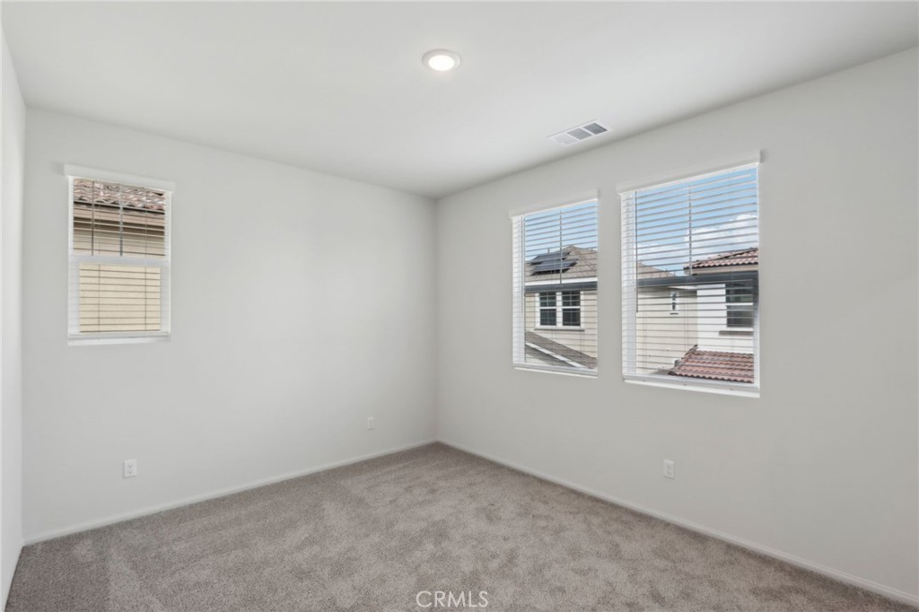29527 Via Cosecha Temecula, CA 92591 - Photo 29 of 35 a view of an empty room with a window