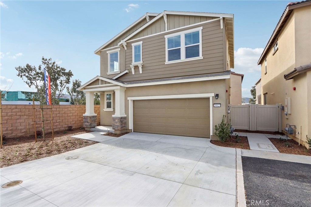 29527 Via Cosecha Temecula, CA 92591 - Photo 3 of 35 a front view of a house with a garage