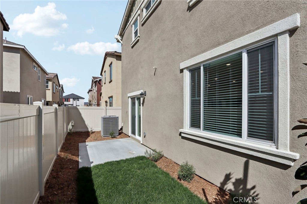 29527 Via Cosecha Temecula, CA 92591 - Photo 33 of 35 a front view of a house with garden