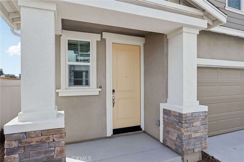 29527 Via Cosecha Temecula, CA 92591 - Photo 4 of 35 a view of front door of house