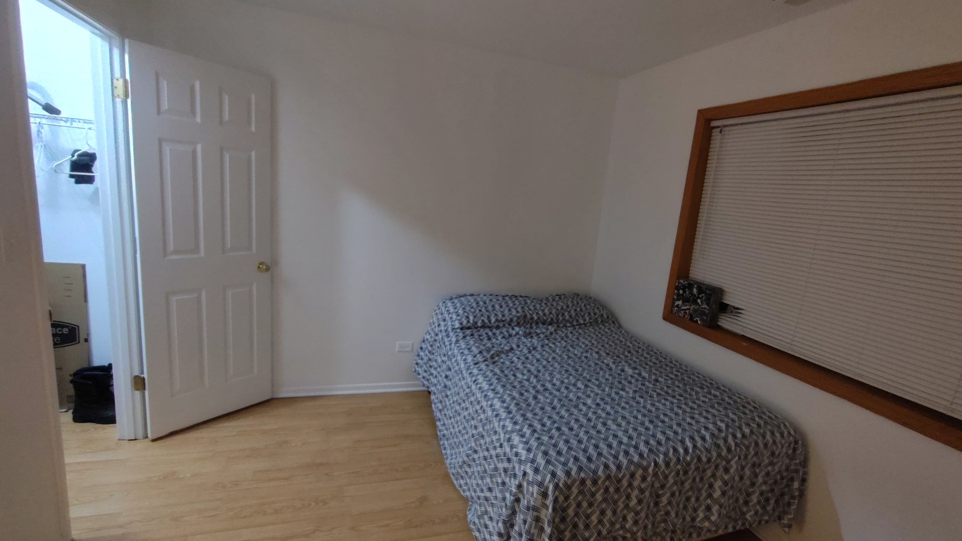 1026 Castilian Court, Unit 113 Glenview, IL 60025 - Photo 15 of 16 a room with a wooden door