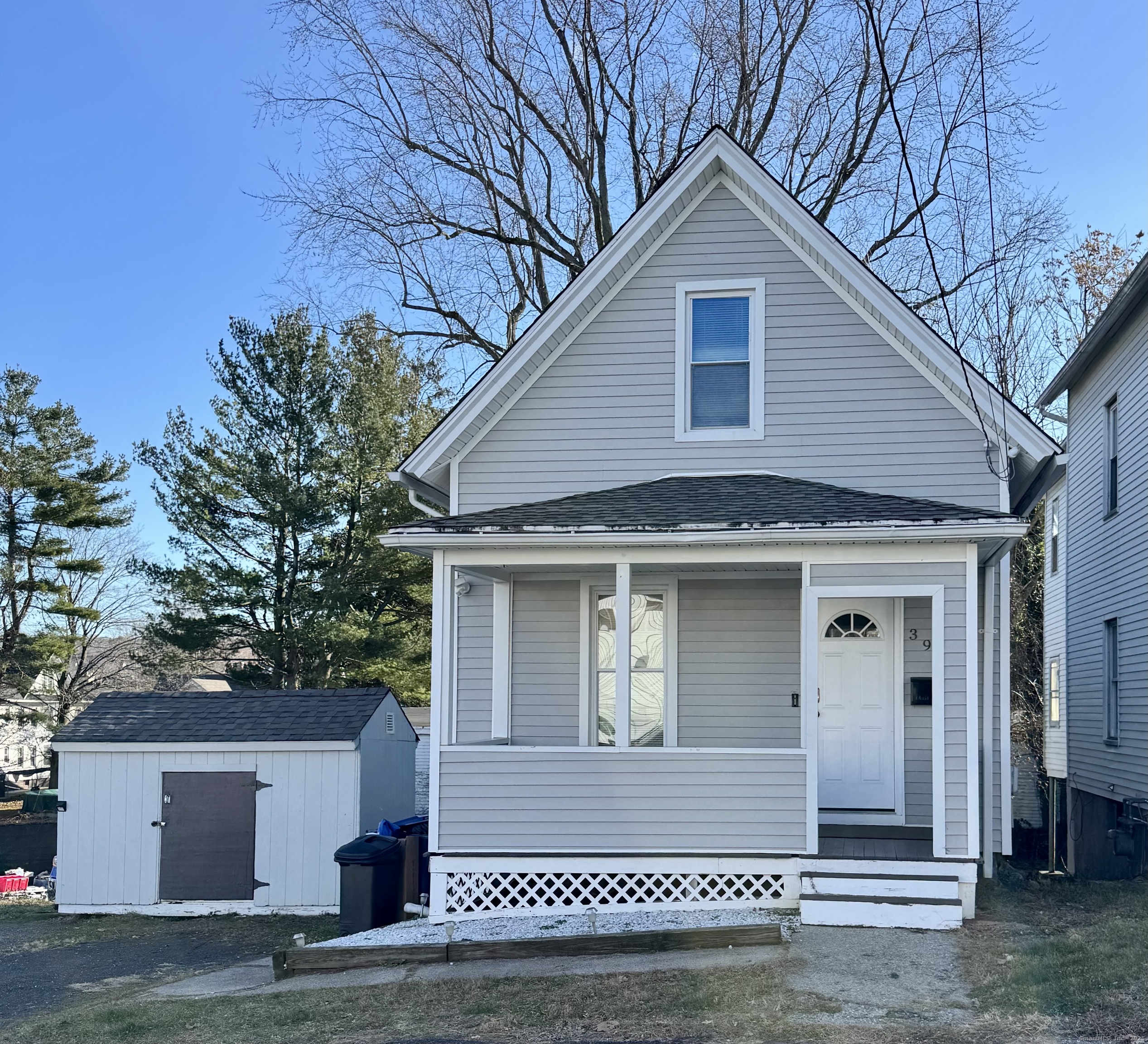 a front view of a house with a garage