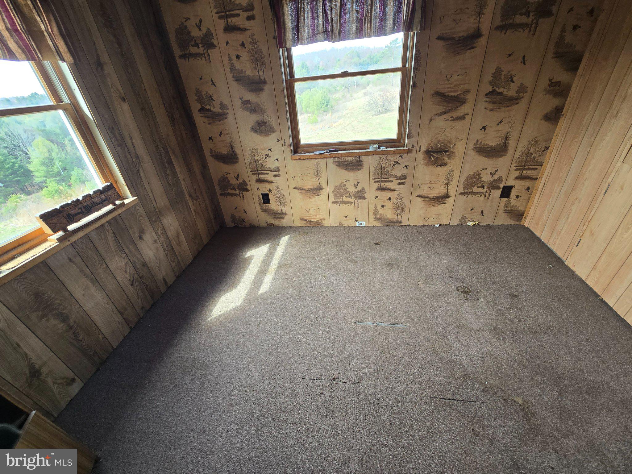 4081 Scootac Road Beech Creek, PA 16822 - Photo 21 of 46 a view of empty room with windows