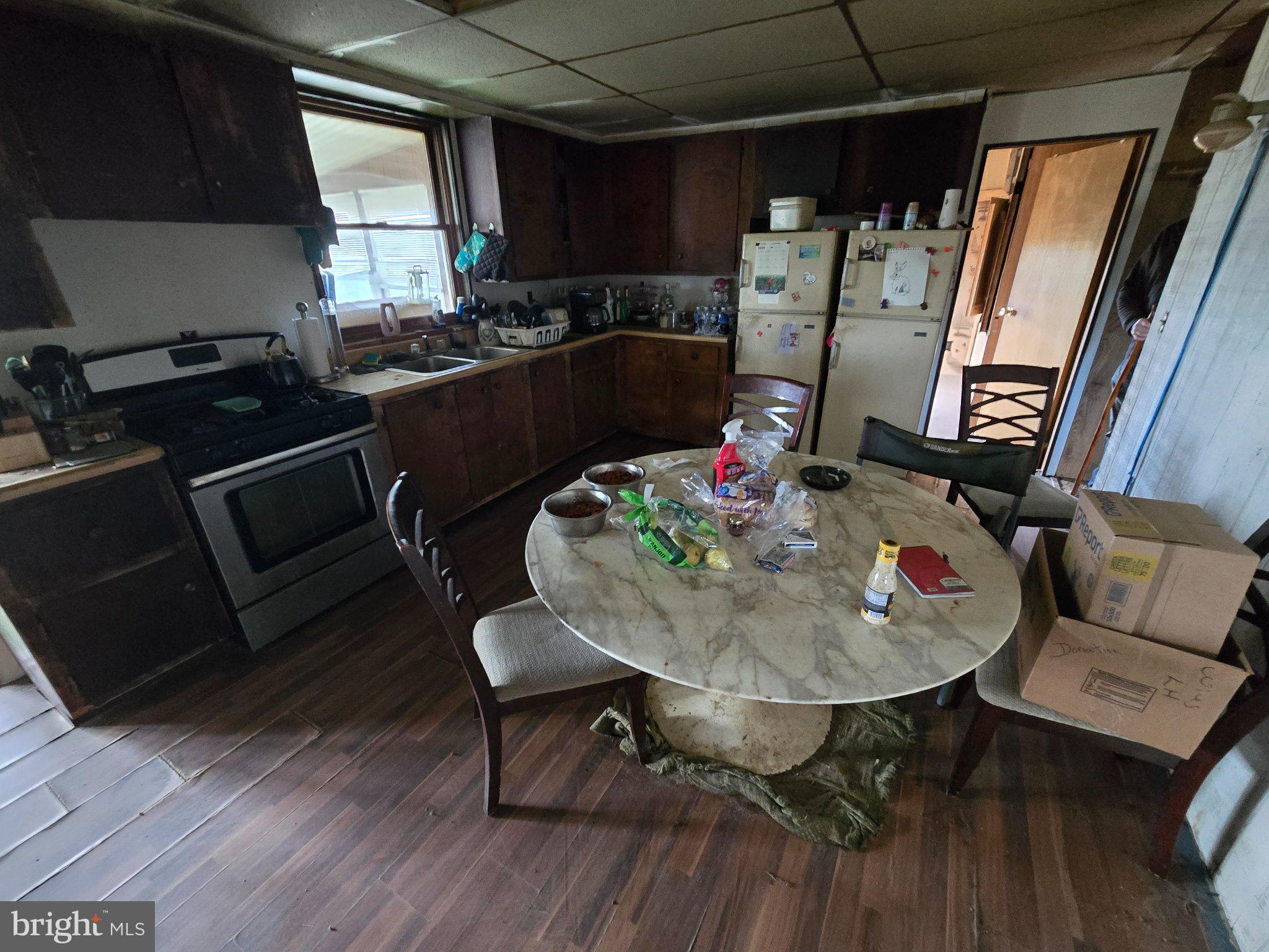 4081 Scootac Road Beech Creek, PA 16822 - Photo 23 of 46 a view of a dining room with furniture window and wooden floor