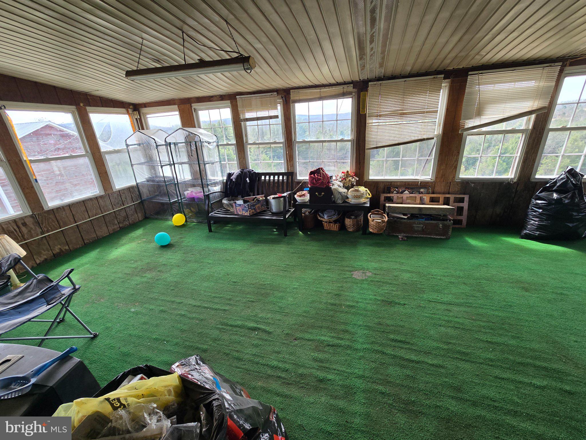 4081 Scootac Road Beech Creek, PA 16822 - Photo 37 of 46 a view of a room with furniture and a garden
