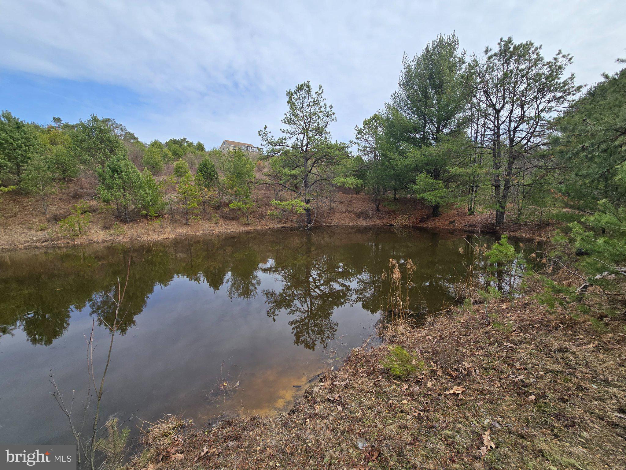 4081 Scootac Road Beech Creek, PA 16822 - Photo 42 of 46 a view of a lake in between two chairs