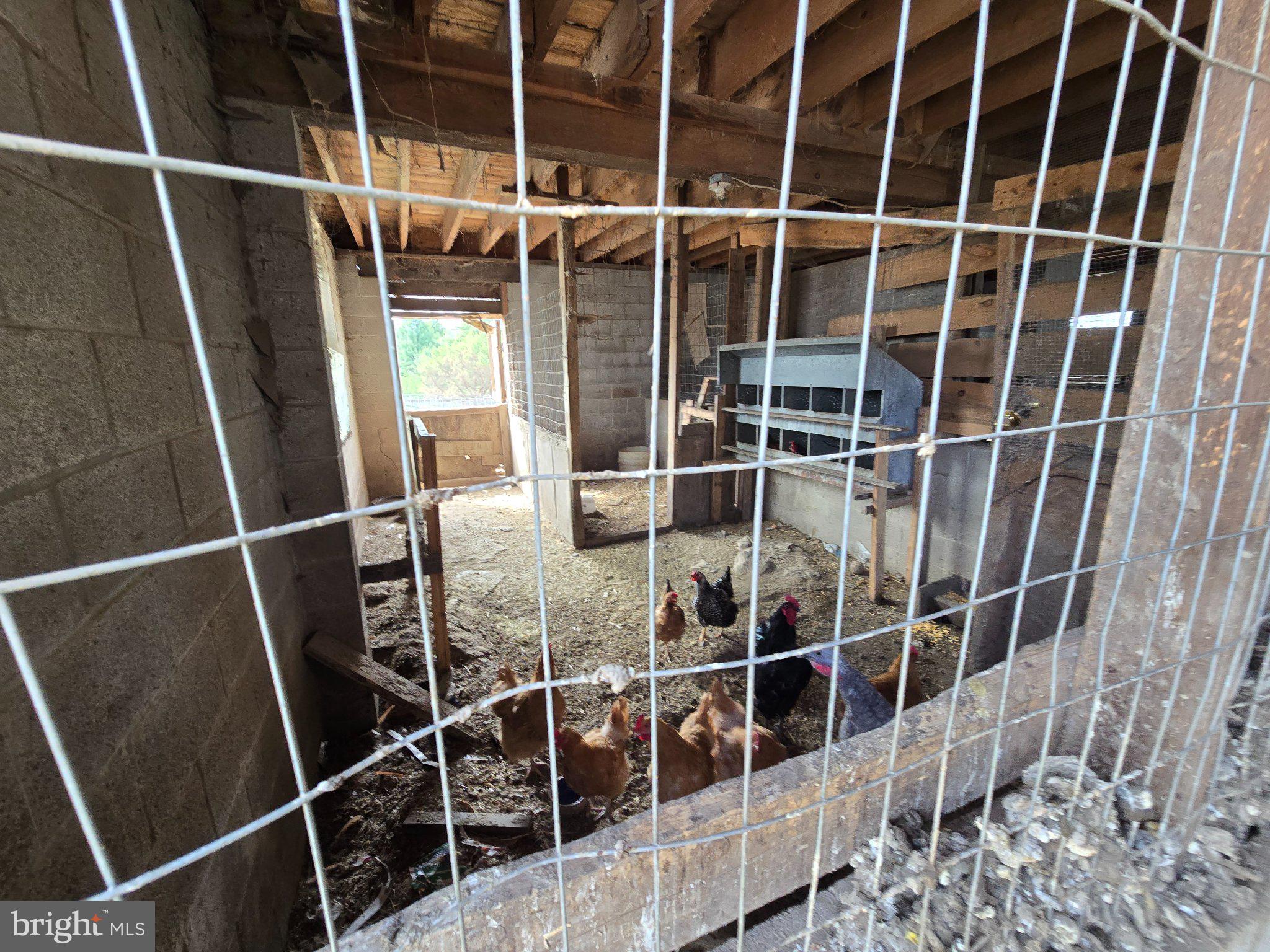 4081 Scootac Road Beech Creek, PA 16822 - Photo 7 of 46 a view of an empty room with wooden floor and door
