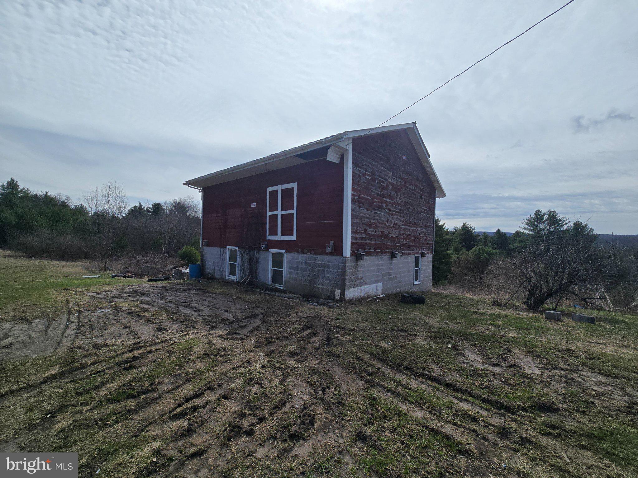 4081 Scootac Road Beech Creek, PA 16822 - Photo 9 of 46 a view of a house with a yard