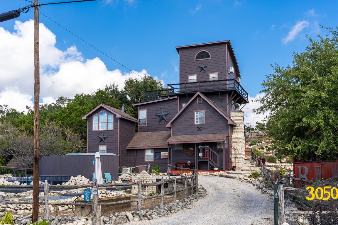 3050 Contour Drive Spring Branch, TX 78070 - Photo 1 of 39 a front view of a house with sitting area
