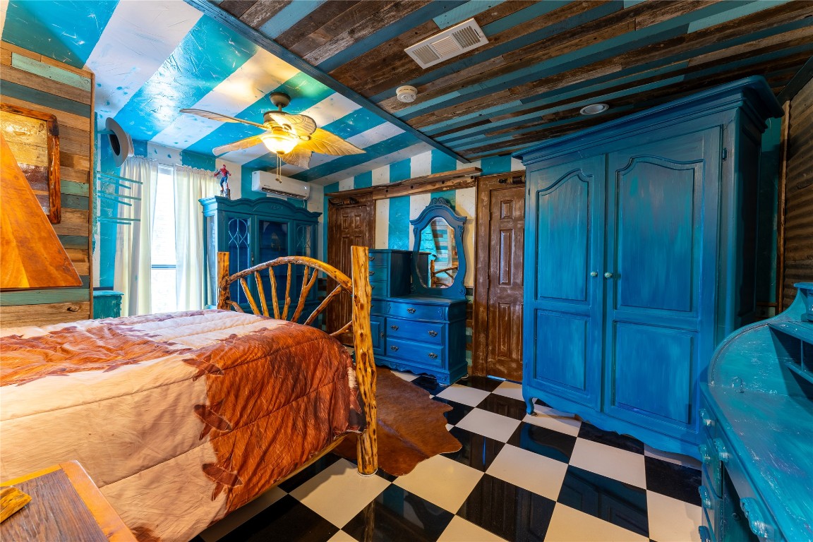 3050 Contour Drive Spring Branch, TX 78070 - Photo 15 of 39 a bedroom with a bed and a large window