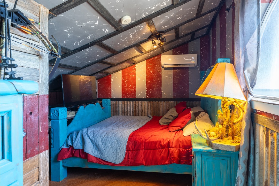 3050 Contour Drive Spring Branch, TX 78070 - Photo 24 of 39 a bed sitting in a bedroom next to a window