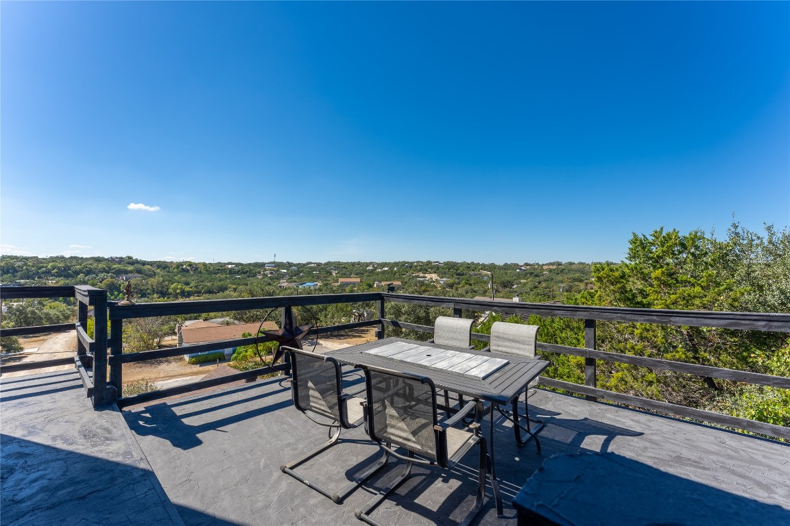 3050 Contour Drive Spring Branch, TX 78070 - Photo 25 of 39 a view of a chairs and table on the terrace