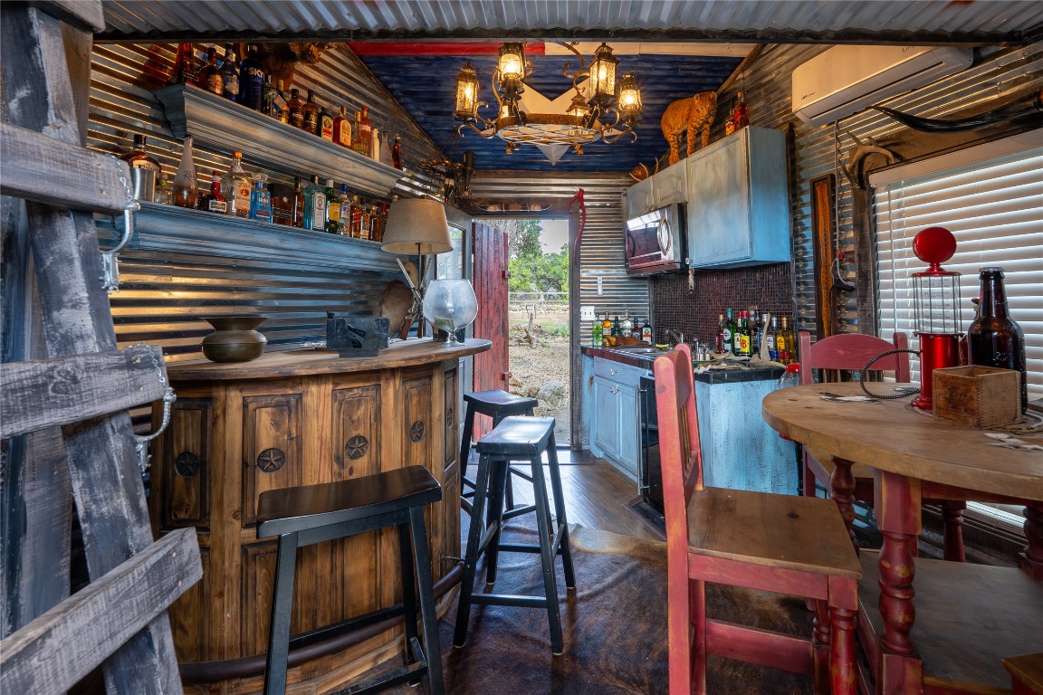 3050 Contour Drive Spring Branch, TX 78070 - Photo 26 of 39 a view of a chairs and table in a patio