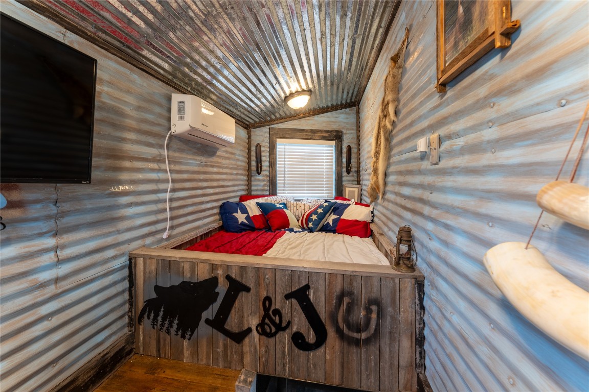 3050 Contour Drive Spring Branch, TX 78070 - Photo 28 of 39 a view of a patio with table and chairs with wooden floor and fence