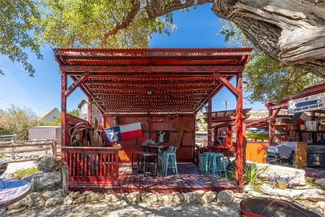 a view of a chairs and tables in patio