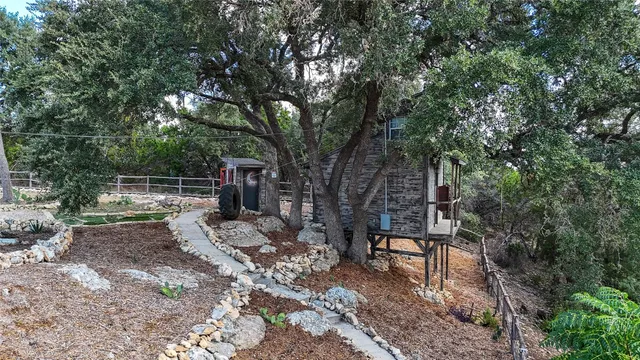 a view of a backyard with tv