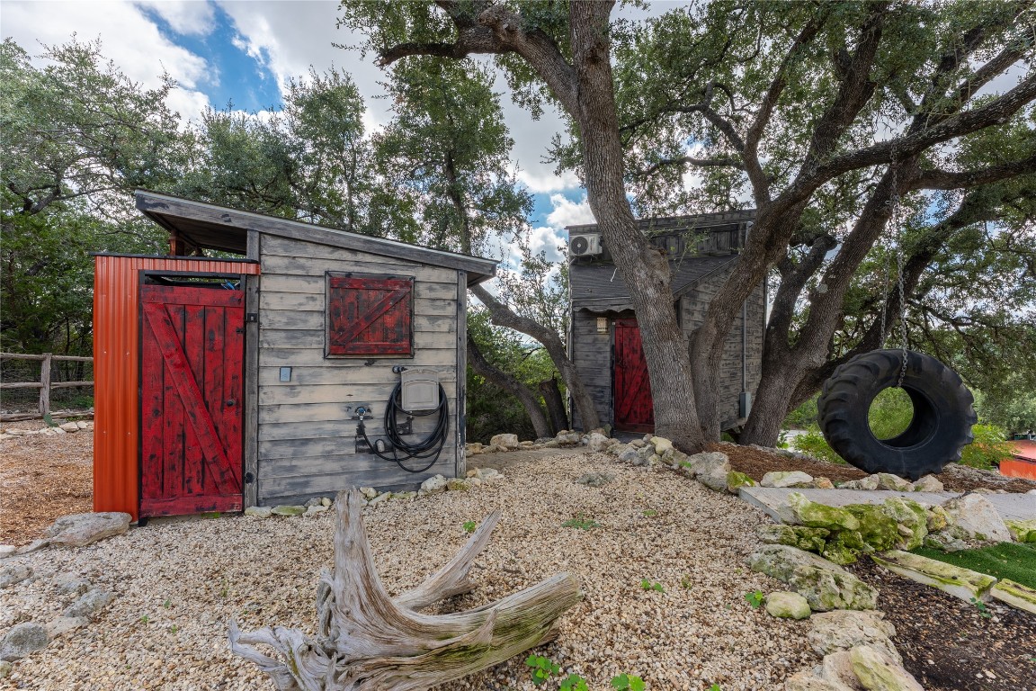 3050 Contour Drive Spring Branch, TX 78070 - Photo 37 of 39 a view of a backyard with tv