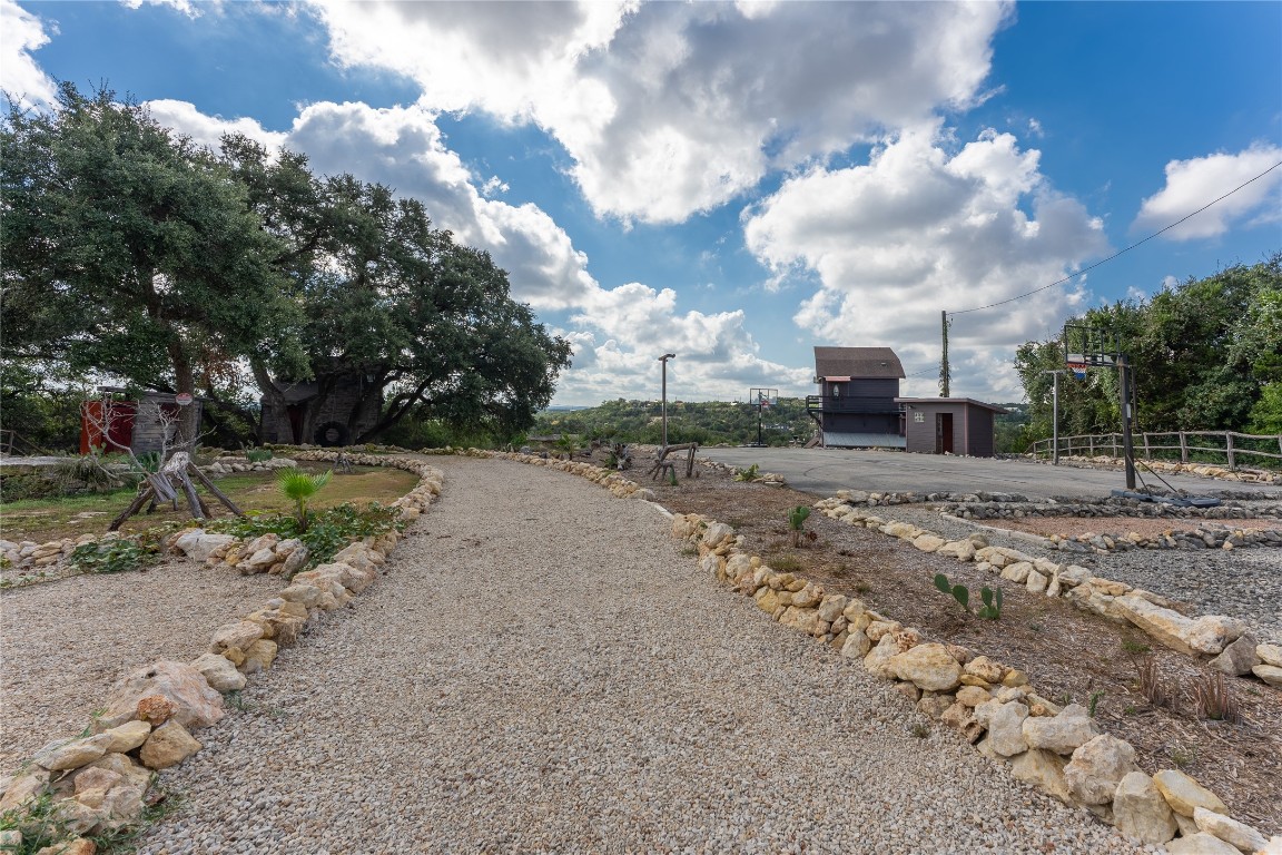 3050 Contour Drive Spring Branch, TX 78070 - Photo 39 of 39 a view of a dry yard with wooden fence
