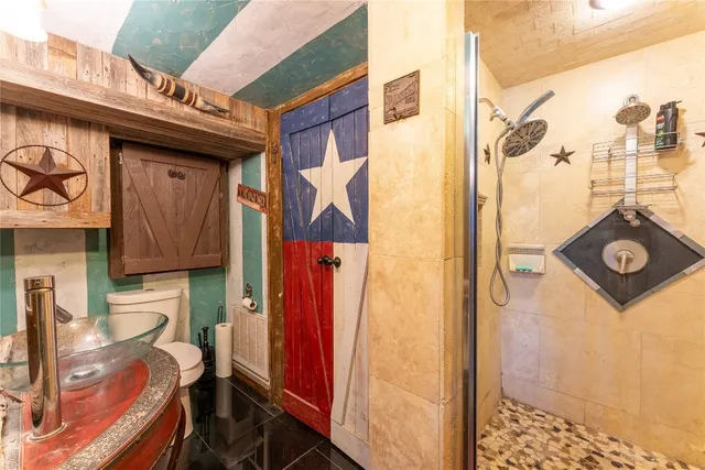 a view of a door and chair in the balcony