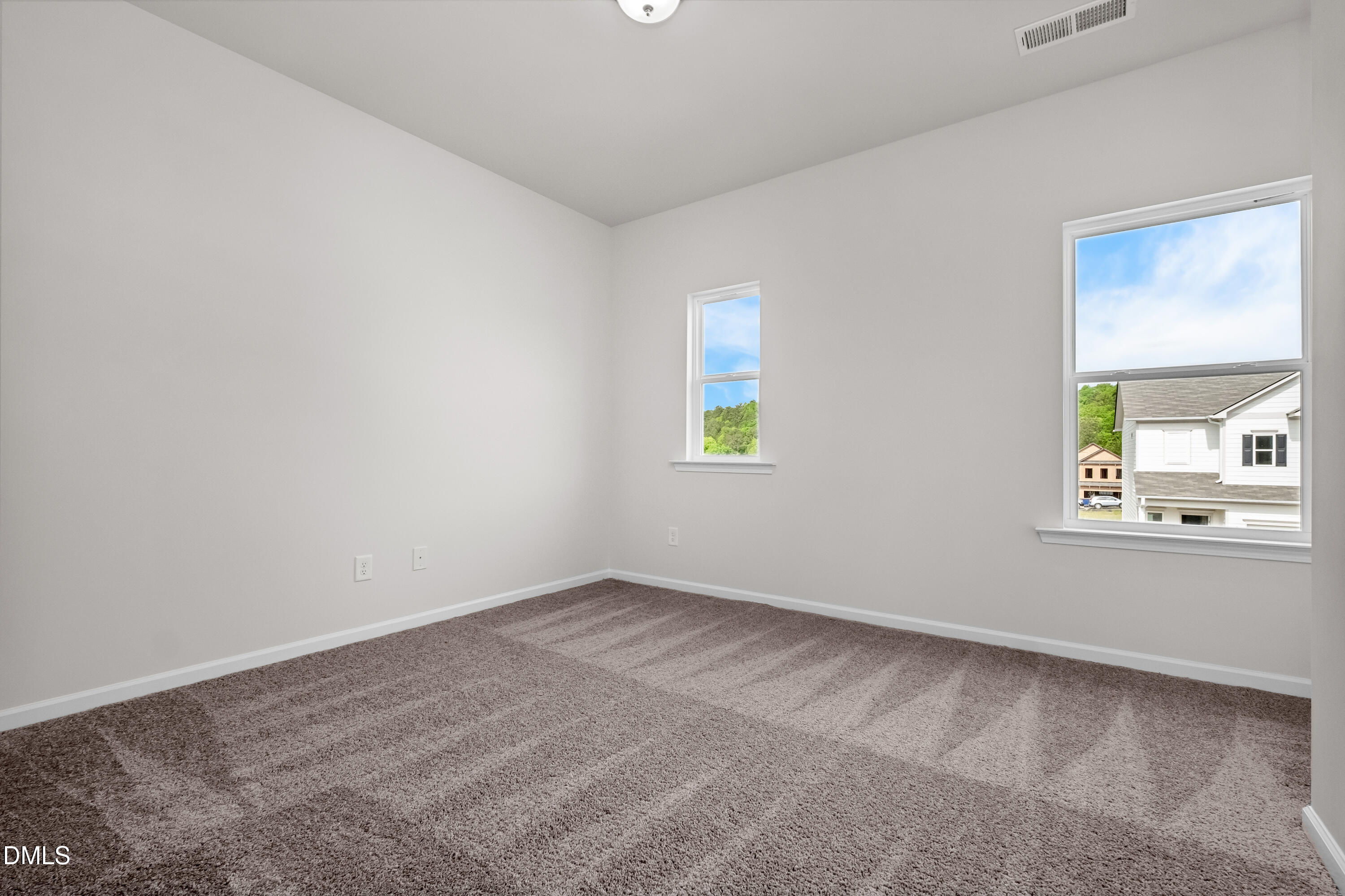 233 Courtside Drive Dunn, NC 28334 - Photo 16 of 29 an empty room with a window