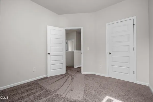 wooden floor & closet in a room
