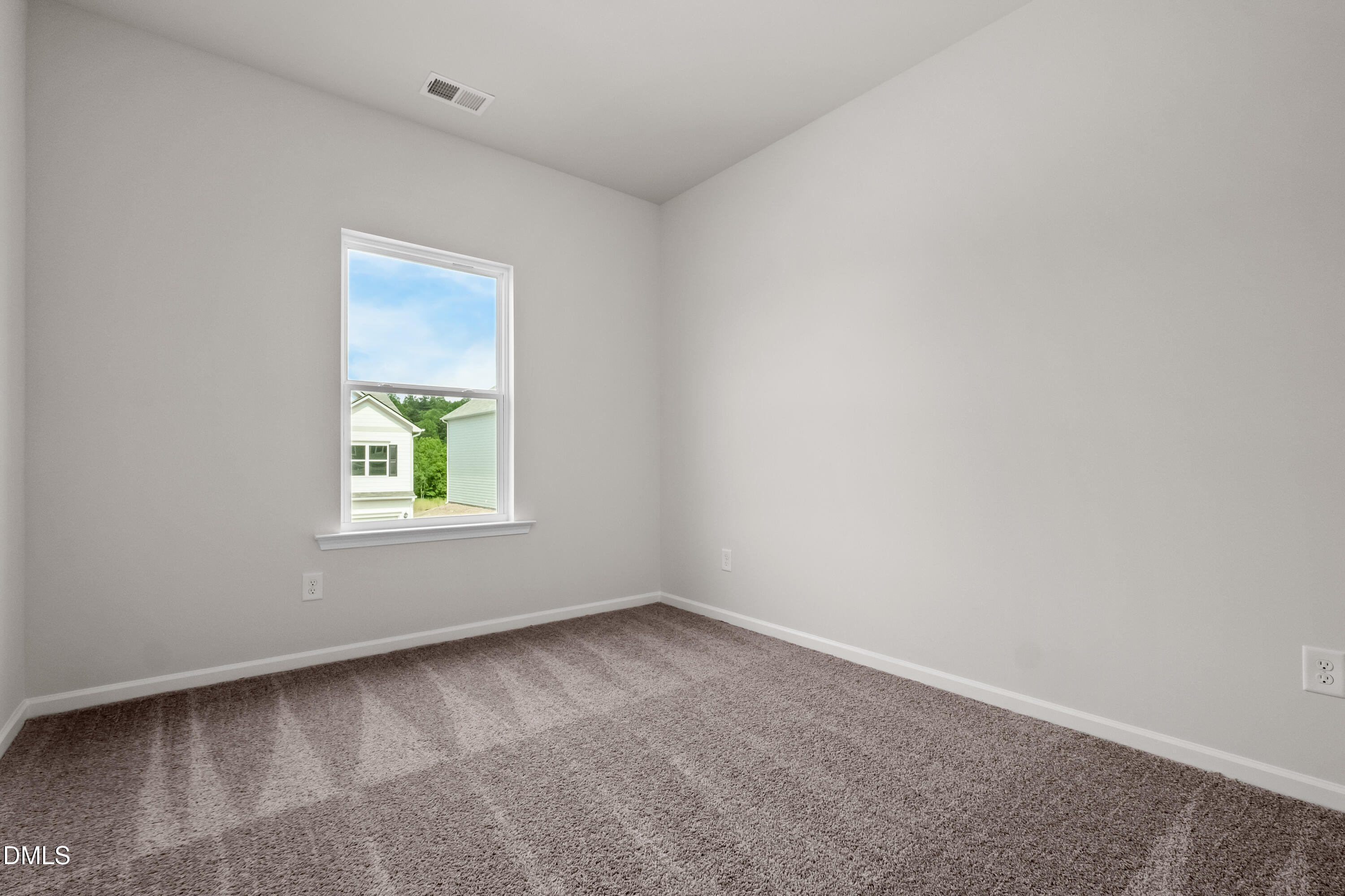 233 Courtside Drive Dunn, NC 28334 - Photo 26 of 29 an empty room with a window