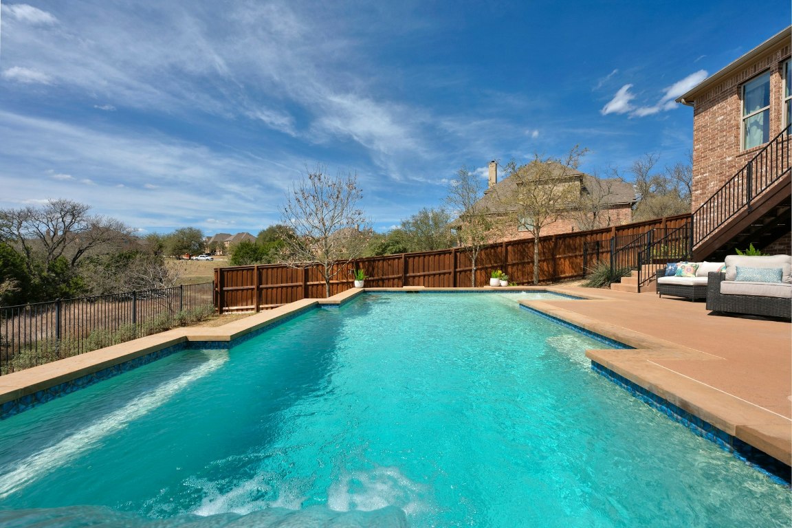 8804 Flycatcher Court Austin, TX 78738 - Photo 31 of 39 a view of a garden with houses