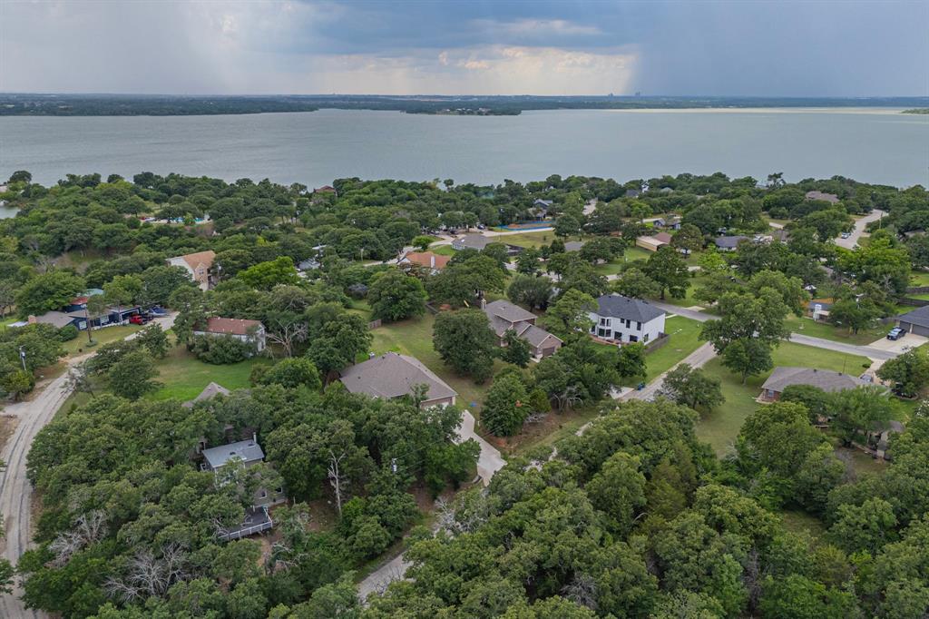563 Valley Drive Oak Point, TX 75068 - Photo 2 of 5 an aerial view of a houses with outdoor space and lake view