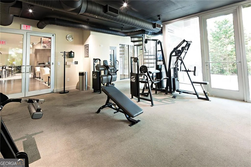 3324 Peachtree Road Northeast, Unit 2713 Atlanta, GA 30326 - Photo 14 of 29 a view of a room with gym equipment