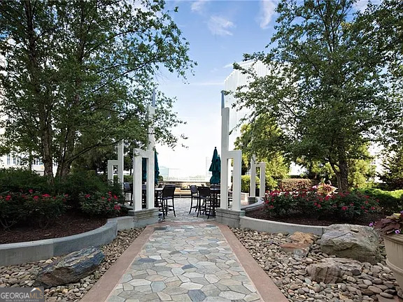 3324 Peachtree Road Northeast, Unit 2713 Atlanta, GA 30326 - Photo 21 of 29 a view of a park with bench and trees