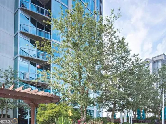 3324 Peachtree Road Northeast, Unit 2713 Atlanta, GA 30326 - Photo 24 of 29 a view of a building with a tree