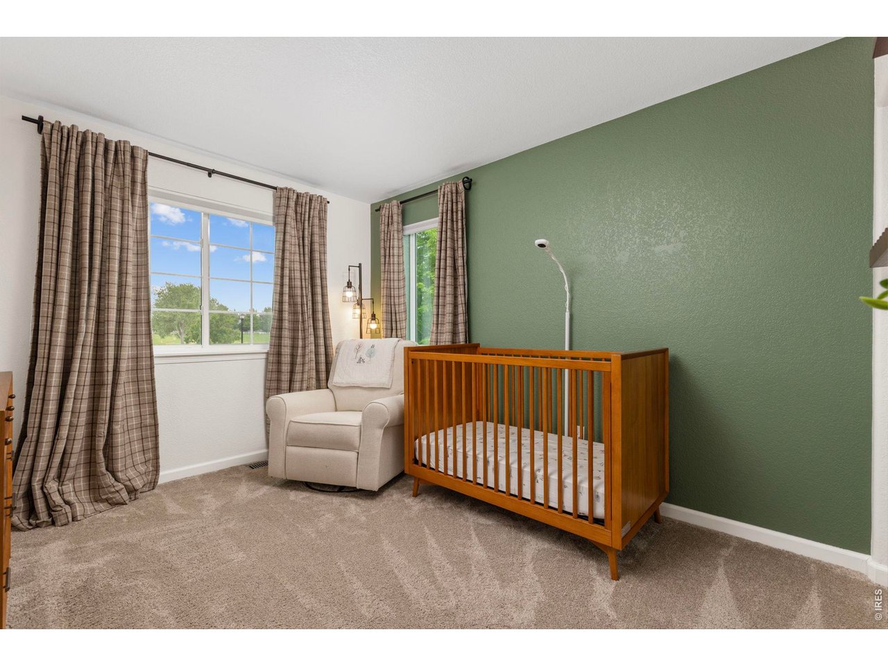 6531 St Vrain Ranch Boulevard Firestone, CO 80504 - Photo 19 of 30 a view of a room with furniture and a window