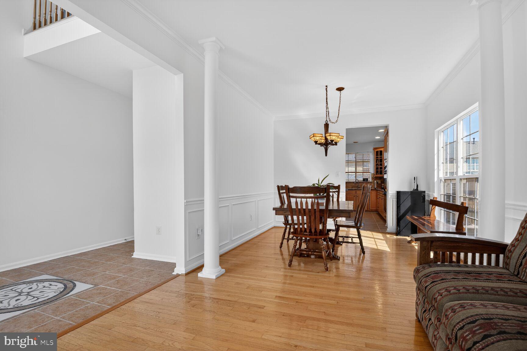 14272 Town Commons Way Gainesville, VA 20155 - Photo 13 of 32 a view of a livingroom with furniture and wooden floor