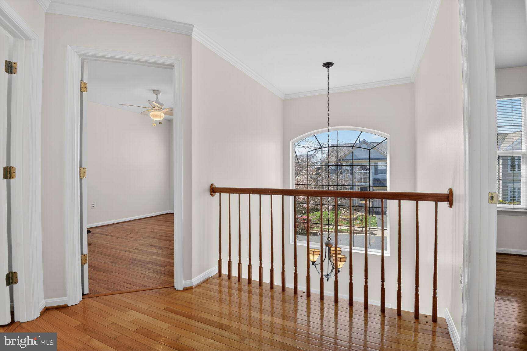 14272 Town Commons Way Gainesville, VA 20155 - Photo 14 of 32 a view of entryway with wooden floor