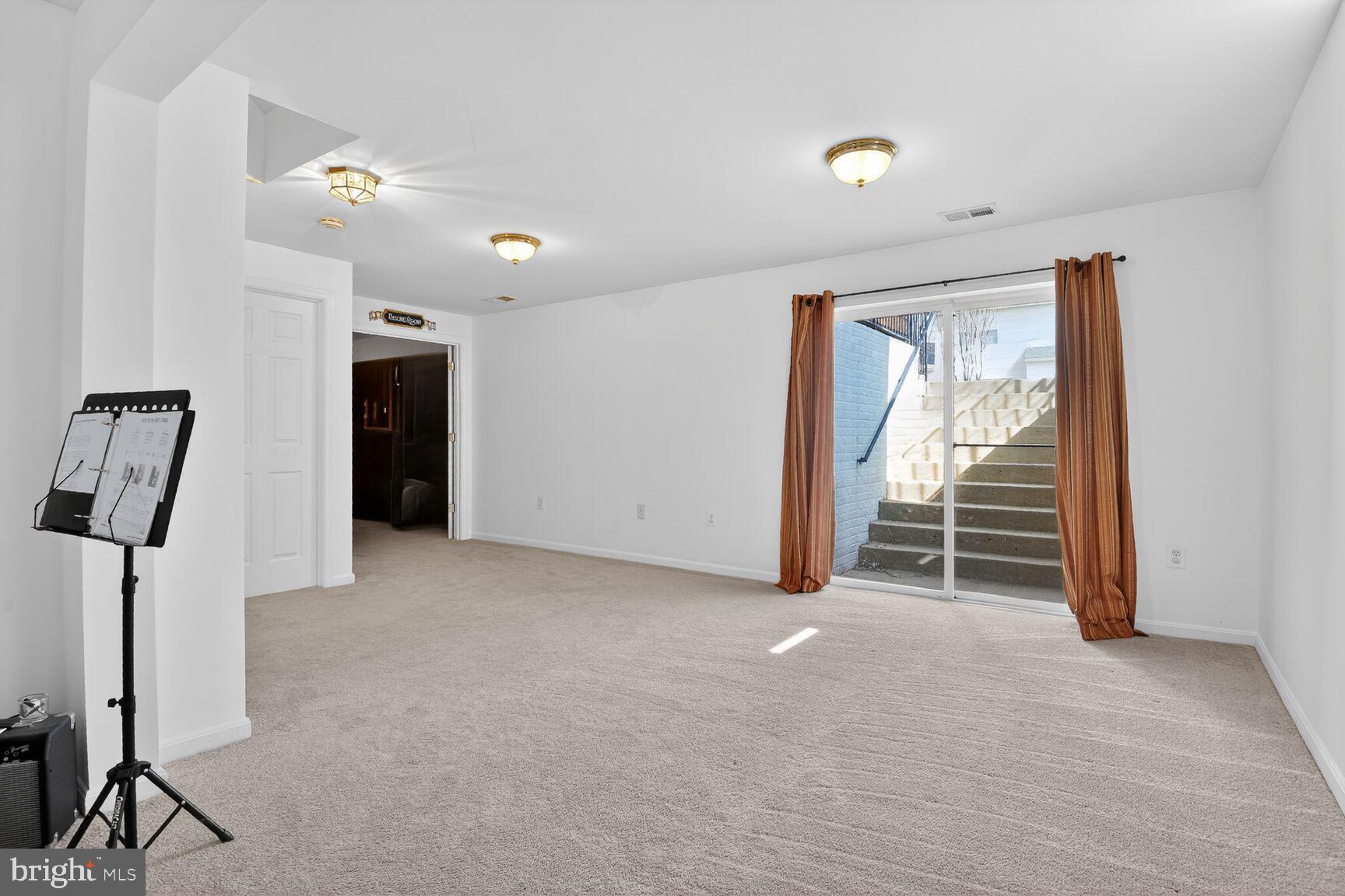 14272 Town Commons Way Gainesville, VA 20155 - Photo 25 of 32 a view of empty room with floor to ceiling window