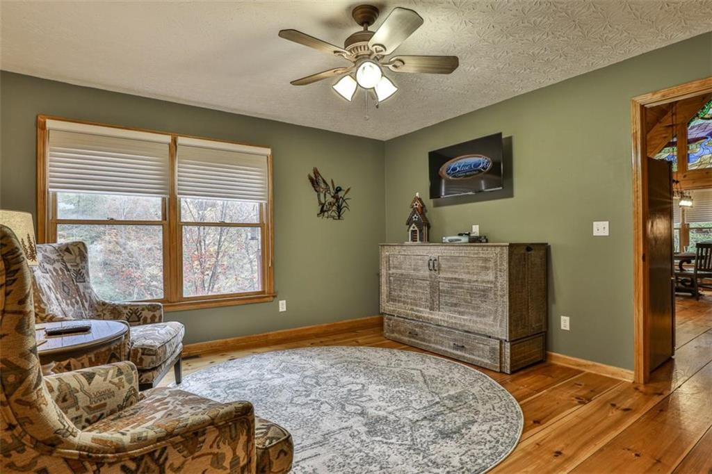 178 Novena Court Ellijay, GA 30540 - Photo 20 of 88 a living room with furniture and a window