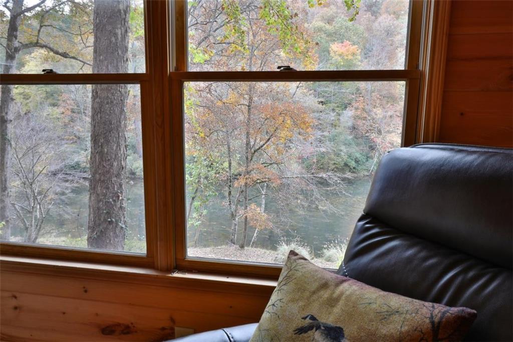 178 Novena Court Ellijay, GA 30540 - Photo 22 of 88 a room with furniture and a window