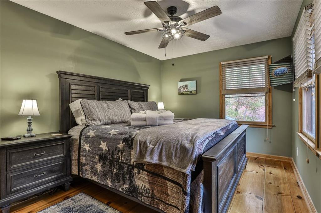 178 Novena Court Ellijay, GA 30540 - Photo 30 of 88 a bedroom with a bed and a window