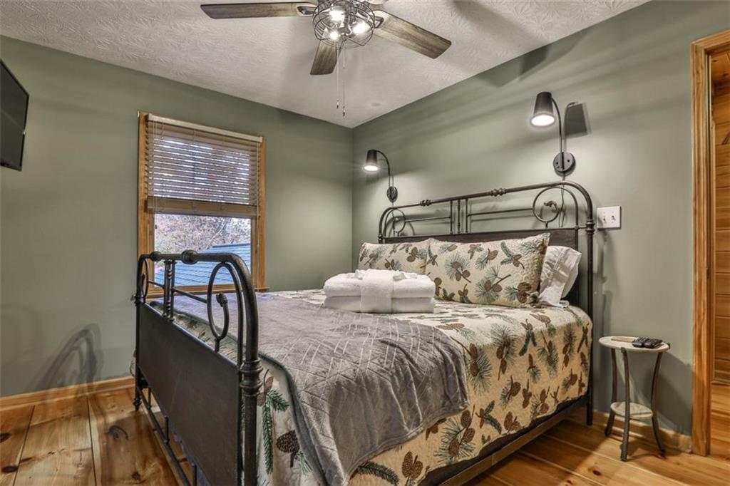 178 Novena Court Ellijay, GA 30540 - Photo 36 of 88 a bedroom with a bed and window