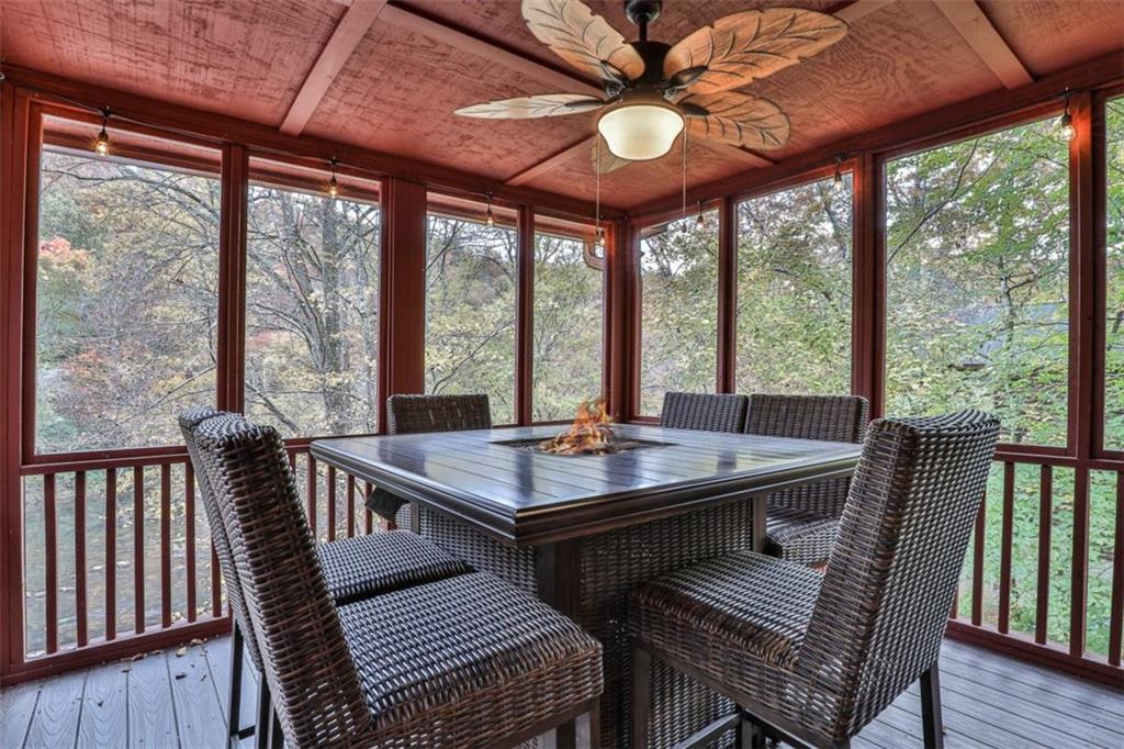 178 Novena Court Ellijay, GA 30540 - Photo 44 of 88 a view of a dining room with furniture window and wooden floor