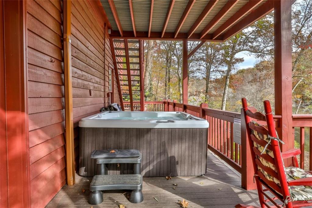 178 Novena Court Ellijay, GA 30540 - Photo 60 of 88 a view of patio with a table and chairs