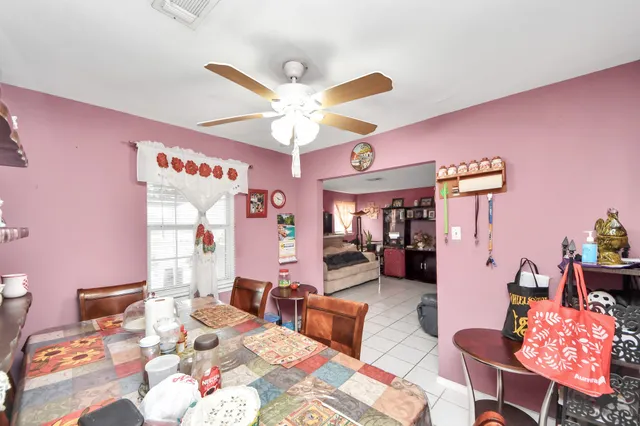 a bedroom with furniture and a chandelier