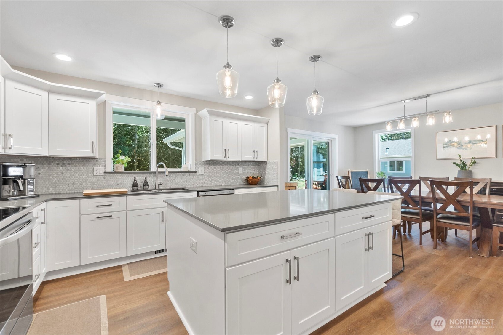 607 Brown Chehalis, WA 98532 - Photo 5 of 31 a kitchen with white cabinets and sink