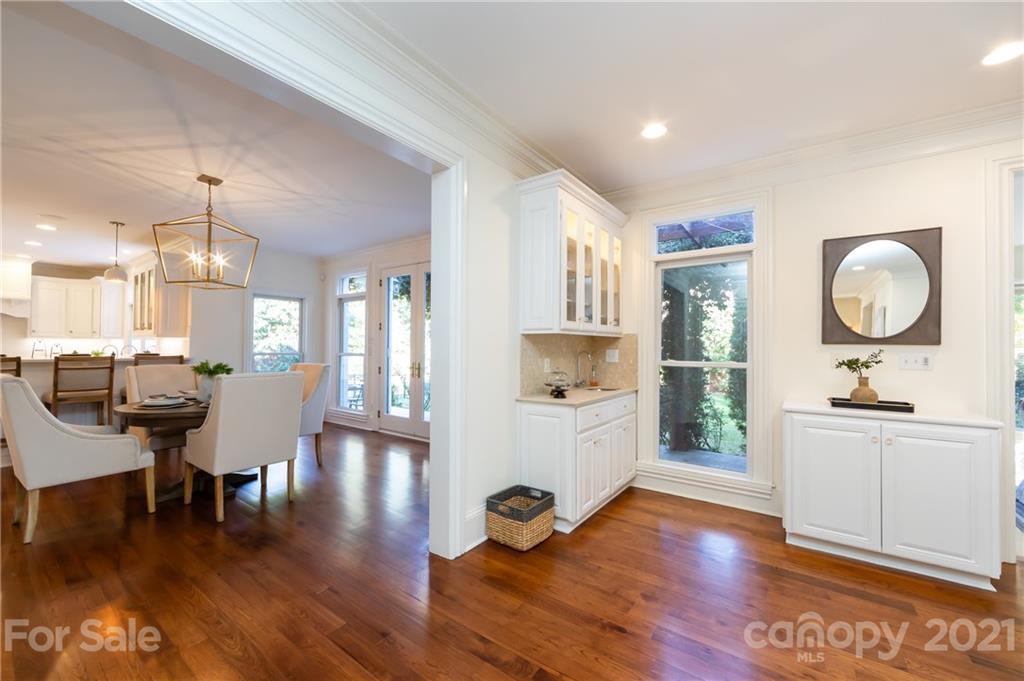 4407 Oglukian Road Charlotte, NC 28226 - Photo 19 of 48 a living room with furniture and a wooden floor