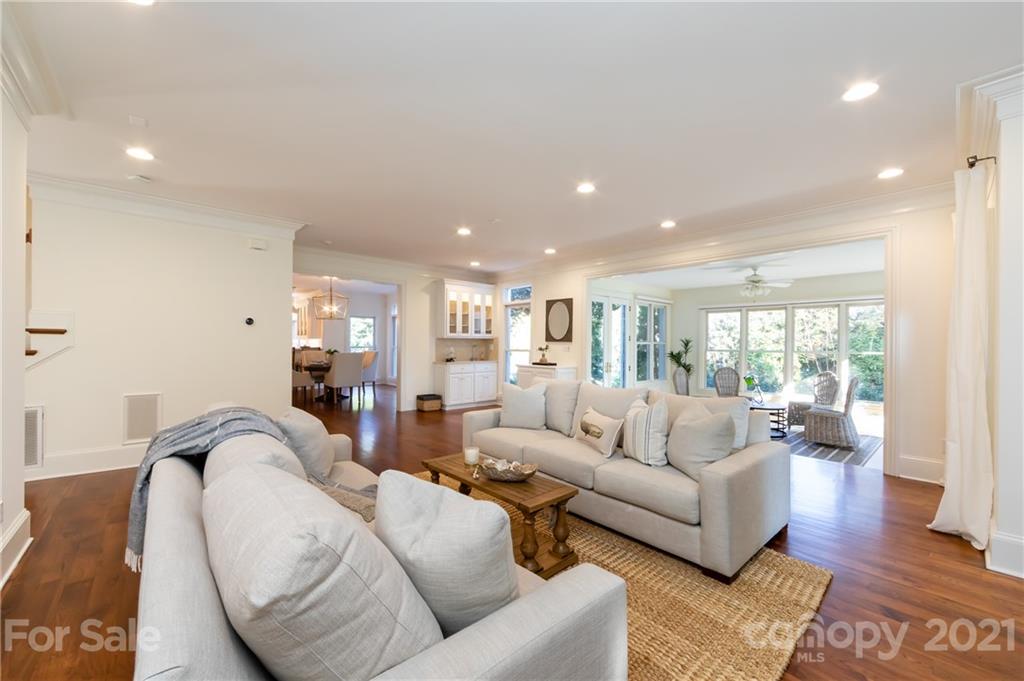 4407 Oglukian Road Charlotte, NC 28226 - Photo 21 of 48 a living room with furniture or couch and a wooden floor
